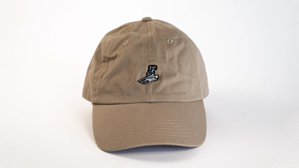 Hudski Bikes Beige cap with a logo on a white background